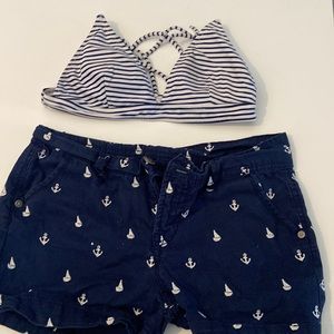 Navy blue and white top and shorts combo top size Small shorts size medium/large
